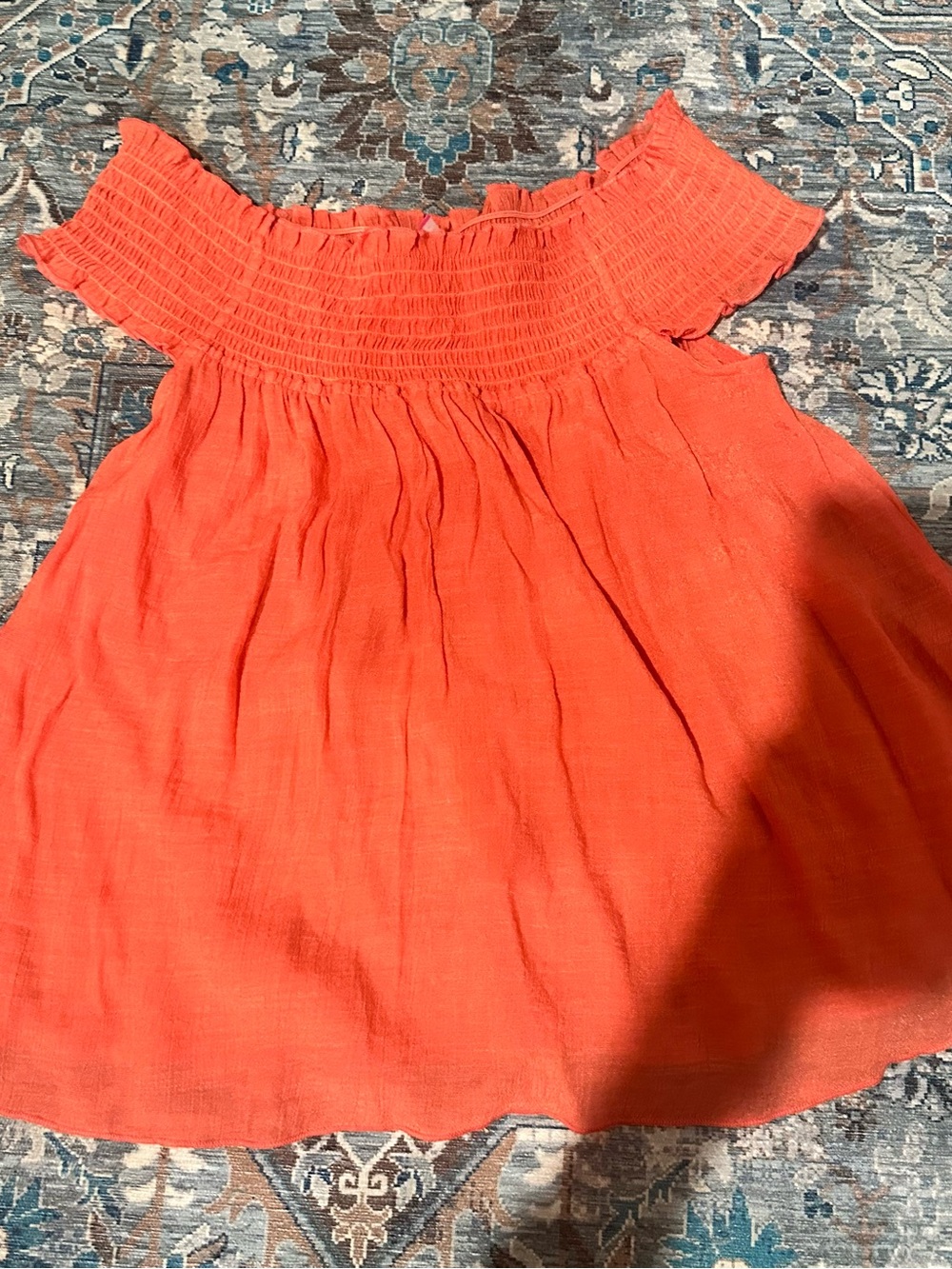 No Boundaries Coral Off-Shoulder Smocked Top